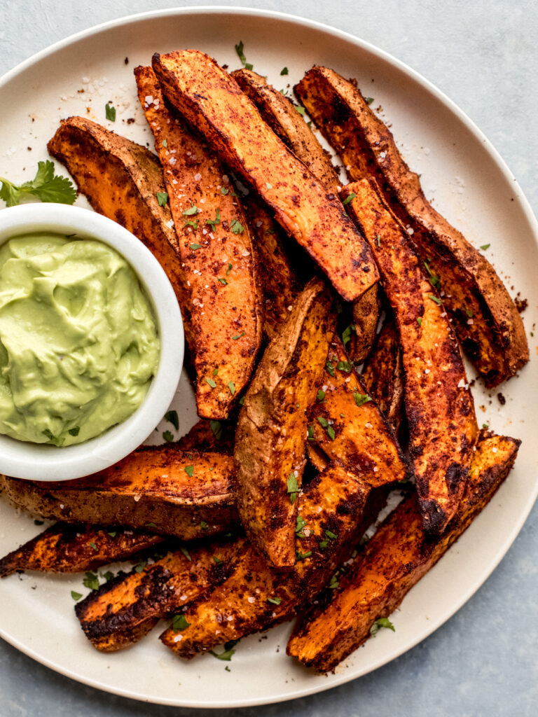 Roasted Sweet Potato Wedges with Avocado Sauce - Little Broken