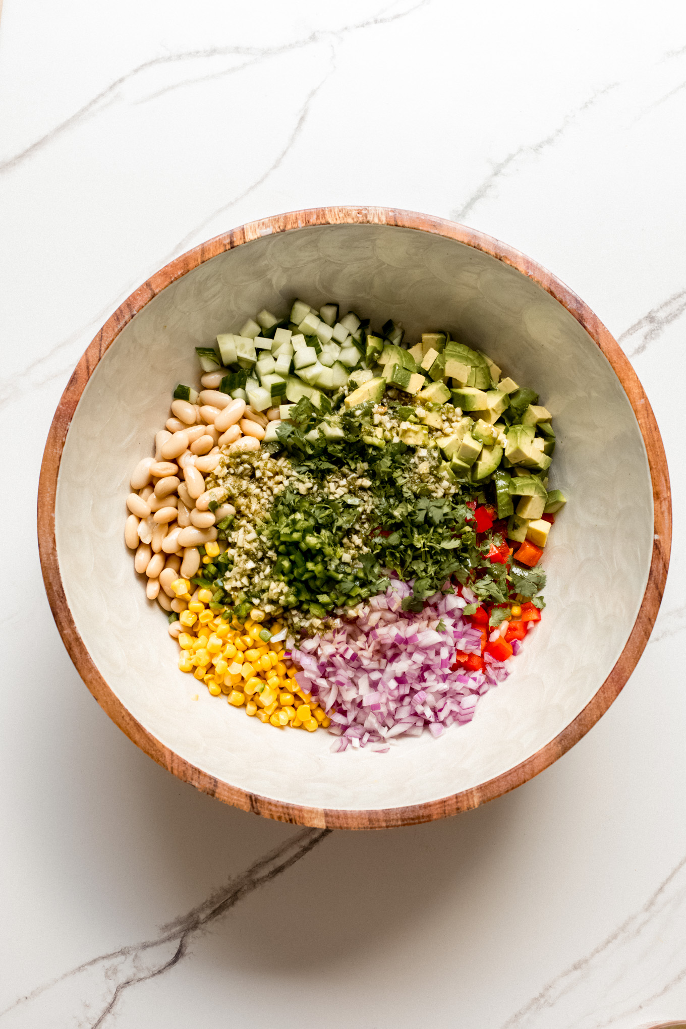 chopped vegetables with beans in a bowl.