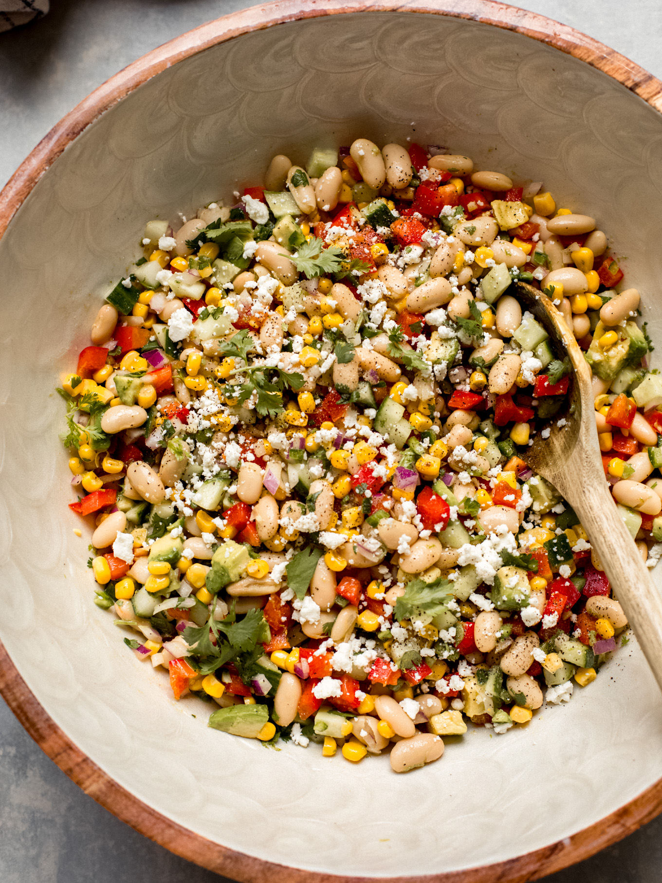 close up cannellini bean salad recipe in a bowl.