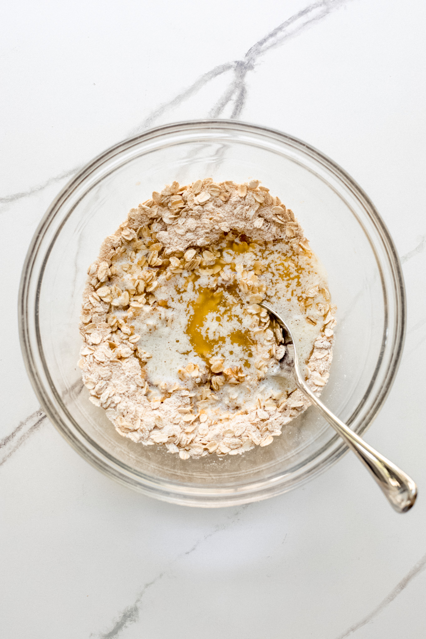 melted butter with oat and four mixture in a bowl.