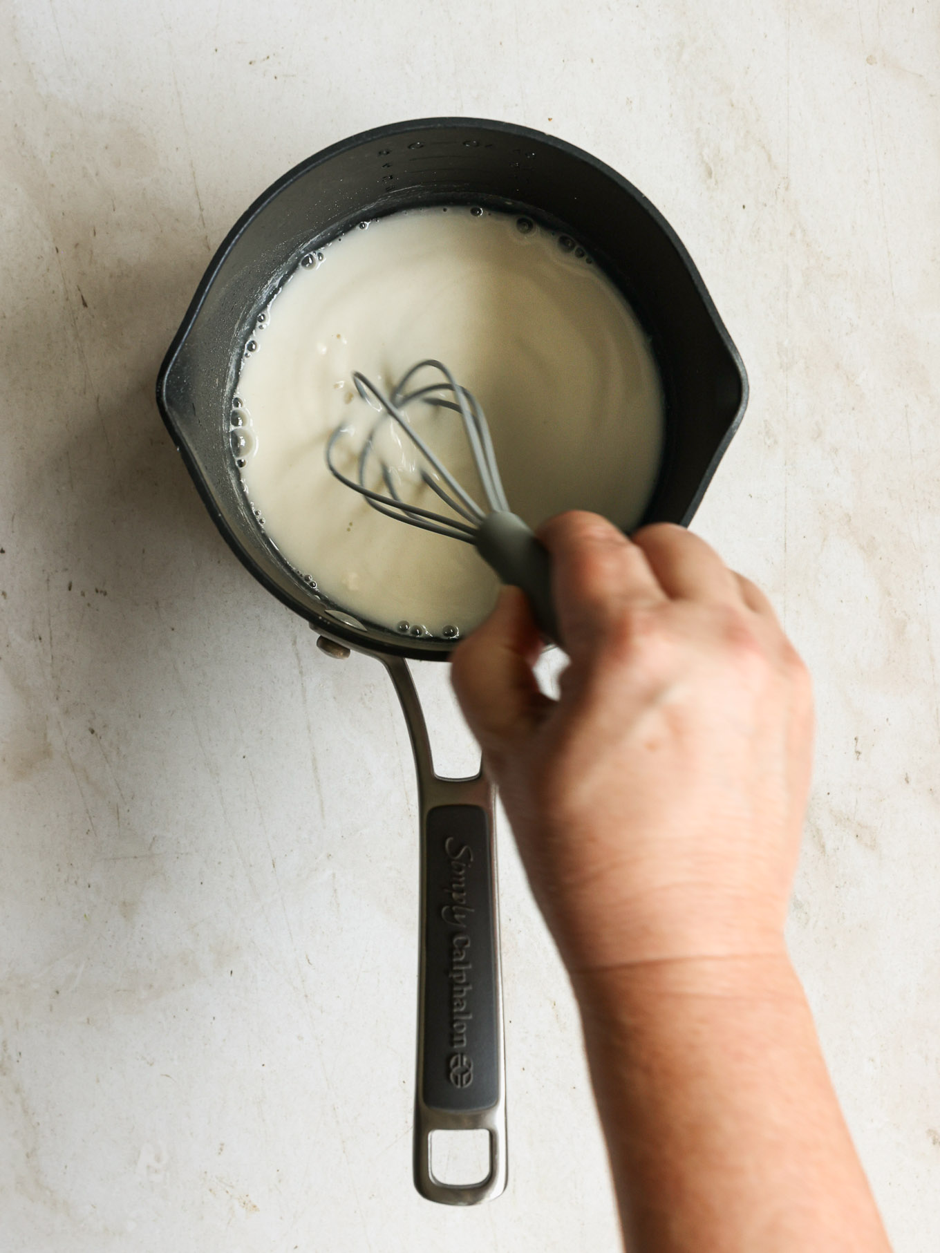 cornstarch slurry in a saucepan.