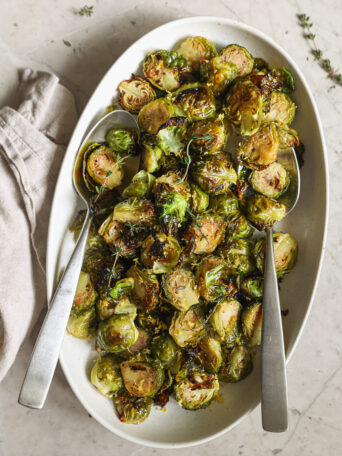 roasted Brussels sprouts on an oval platter.